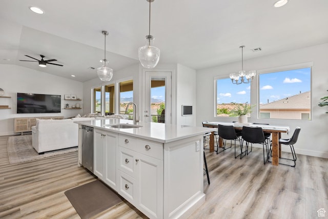 1432 Boys Pond Cir, Santa Clara, UT 84765 - kitchen featuring a sink, dishwasher, light countertops, light wood finished floors, and recessed lighting