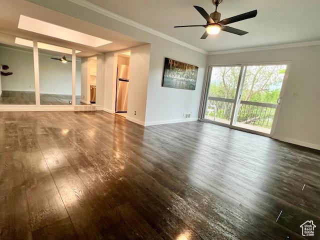4969 S Eastridge Ln E Unit 174, Salt Lake City, UT 84117 - unfurnished living room featuring a ceiling fan, dark wood finished floors, baseboards, and ornamental molding