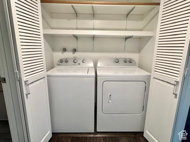 4969 S Eastridge Ln E Unit 174, Salt Lake City, UT 84117 - laundry room with washer and dryer and dark wood-style floors