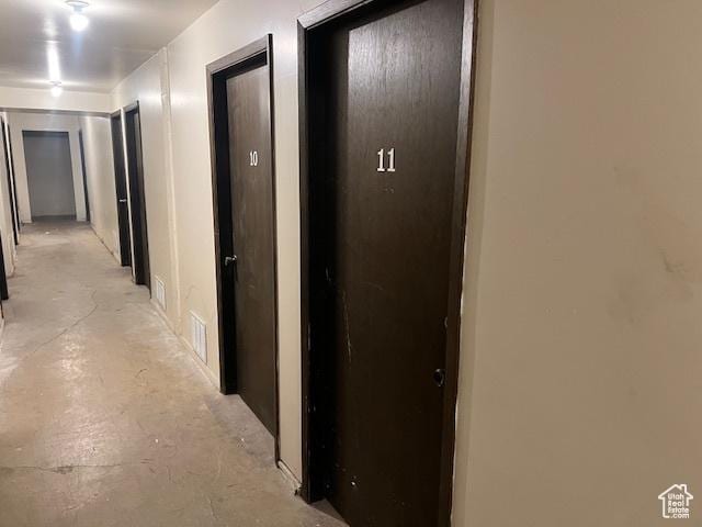 4969 S Eastridge Ln E Unit 174, Salt Lake City, UT 84117 - hall with unfinished concrete flooring