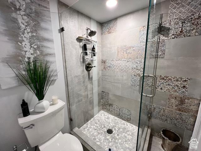 4969 S Eastridge Ln E Unit 174, Salt Lake City, UT 84117 - bathroom with toilet and a shower stall