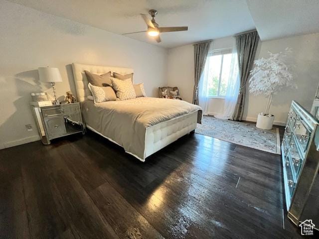 4969 S Eastridge Ln E Unit 174, Salt Lake City, UT 84117 - bedroom with wood finished floors, baseboards, and ceiling fan