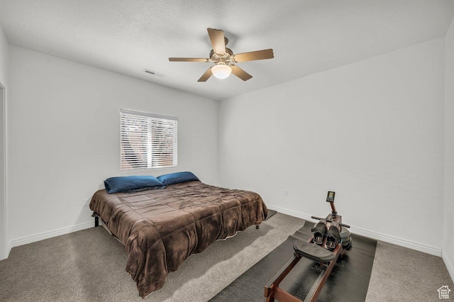 1165 W Indian Hills Dr Unit 236, St George, UT 84770 - bedroom with baseboards, carpet flooring, and ceiling fan