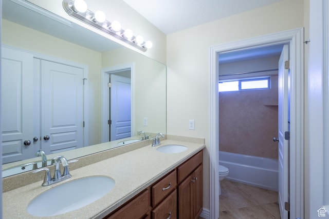 407 E Clay Ln, Lehi, UT 84043 - bathroom featuring toilet, double vanity, and tile patterned flooring