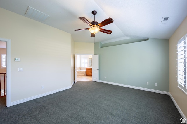 407 E Clay Ln, Lehi, UT 84043 - unfurnished room featuring ceiling fan, dark carpet, vaulted ceiling, and baseboards
