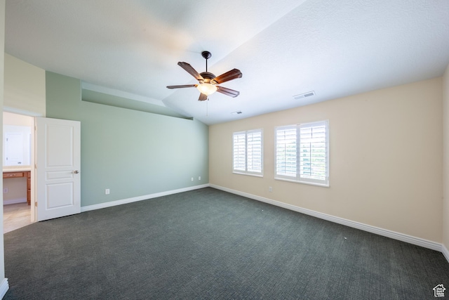 407 E Clay Ln, Lehi, UT 84043 - unfurnished room featuring dark colored carpet, a ceiling fan, baseboards, and lofted ceiling