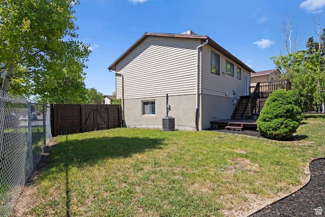 5063 W Milstead Ln, Kearns, UT 84118 - view of side of property with stairway, a deck, and central AC unit
