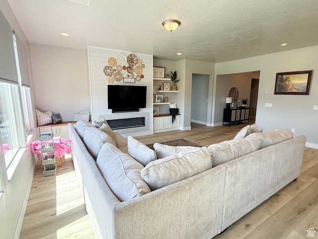 5893 S Kastra Ln, St George, UT 84790 - living area featuring light wood-style flooring, recessed lighting, and a textured ceiling