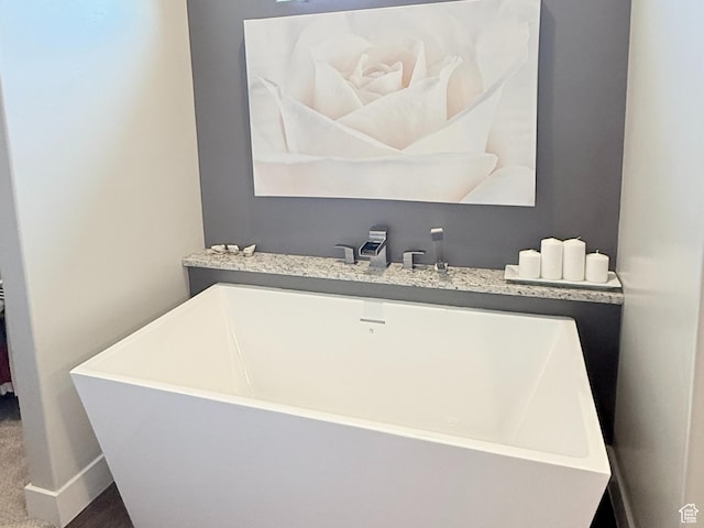 5893 S Kastra Ln, St George, UT 84790 - bathroom with a freestanding tub and baseboards