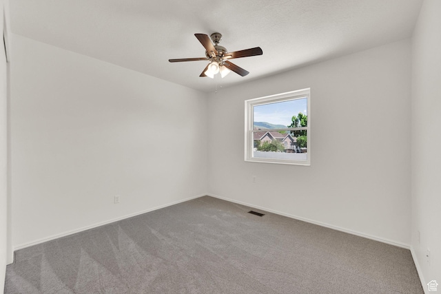 1261 E Hillsden Rd N, Layton, UT 84040 - carpeted empty room featuring baseboards and a ceiling fan