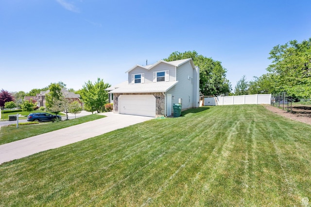 1261 E Hillsden Rd N, Layton, UT 84040 - view of front of home featuring an attached garage, driveway, and stone siding