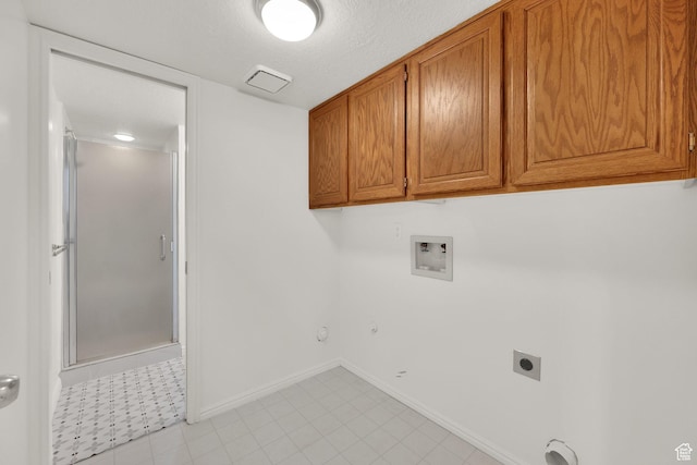 1261 E Hillsden Rd N, Layton, UT 84040 - washroom featuring washer hookup, cabinet space, hookup for a gas dryer, electric dryer hookup, and baseboards