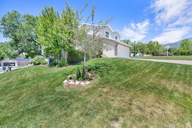1261 E Hillsden Rd N, Layton, UT 84040 - view of front of house with a front lawn and a garage