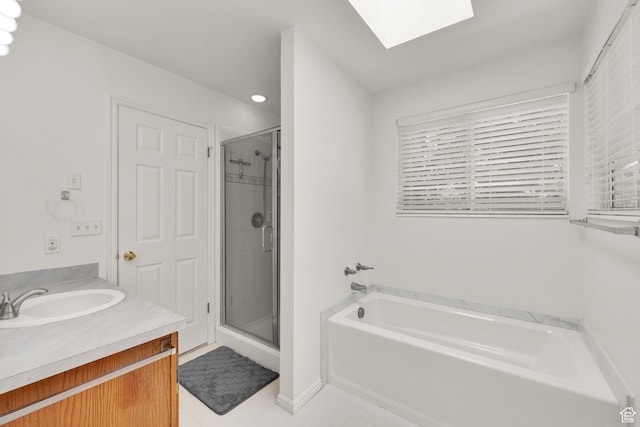 1261 E Hillsden Rd N, Layton, UT 84040 - full bath with a skylight, a garden tub, a stall shower, vanity, and recessed lighting