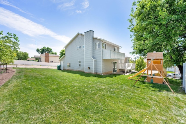 1261 E Hillsden Rd N, Layton, UT 84040 - rear view of property with a playground and a chimney