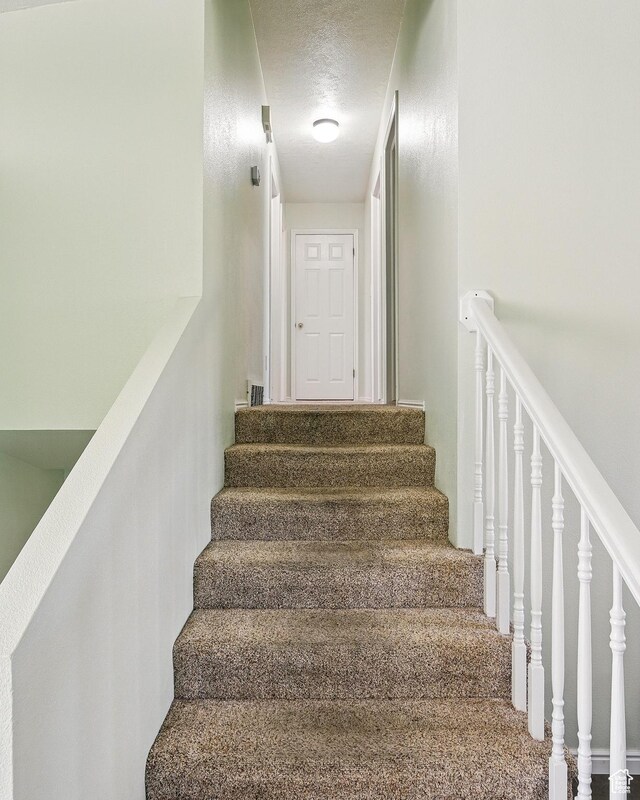324 W 1650 N, Cedar City, UT 84721 - stairway with a textured ceiling
