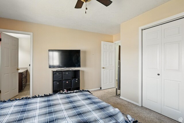 324 W 1650 N, Cedar City, UT 84721 - bedroom featuring light carpet, baseboards, a closet, and a ceiling fan