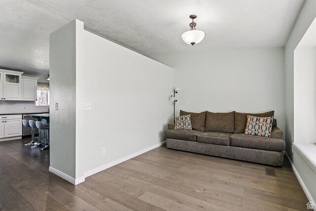 324 W 1650 N, Cedar City, UT 84721 - living room featuring dark wood-type flooring and baseboards