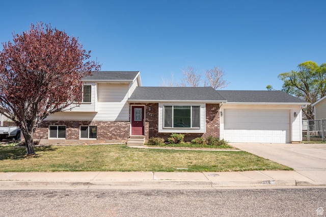 324 W 1650 N, Cedar City, UT 84721 - split level home with brick siding, a garage, driveway, and entry steps
