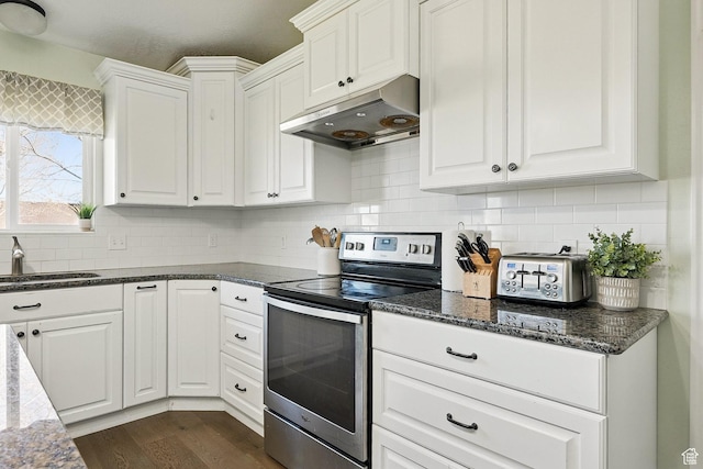 324 W 1650 N, Cedar City, UT 84721 - kitchen with stainless steel electric stove, under cabinet range hood, a sink, white cabinets, and decorative backsplash
