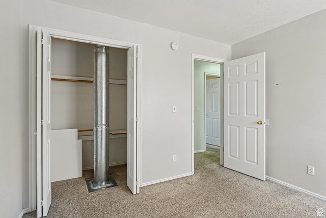 324 W 1650 N, Cedar City, UT 84721 - unfurnished bedroom with a closet, carpet floors, and baseboards