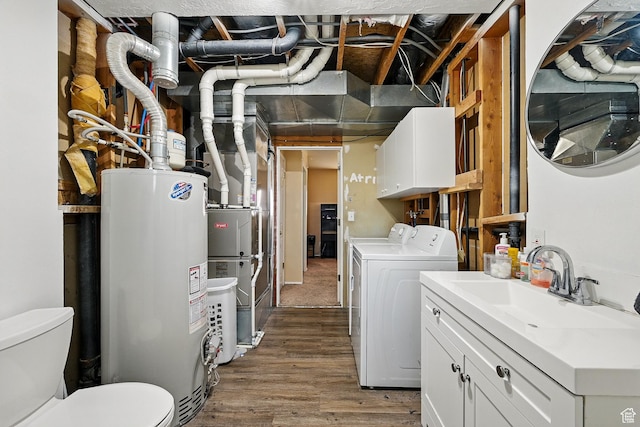 324 W 1650 N, Cedar City, UT 84721 - laundry room featuring gas water heater, separate washer and dryer, and wood finished floors