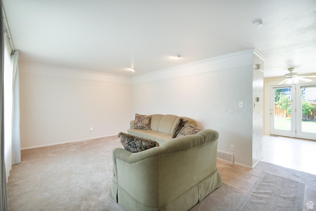 557 N 1160 E, Orem, UT 84097 - living room with light colored carpet, ornamental molding, ceiling fan, and baseboards
