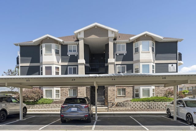56 E Resaca Dr Unit A-12, Sandy, UT 84070 - view of building exterior with covered parking