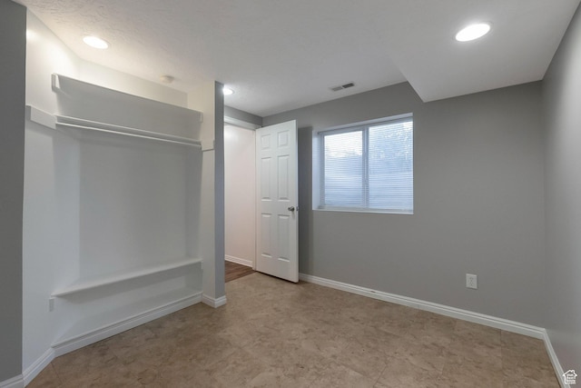 3388 W Briar Dr S, West Jordan, UT 84084 - unfurnished bedroom with recessed lighting, baseboards, and tile patterned floors
