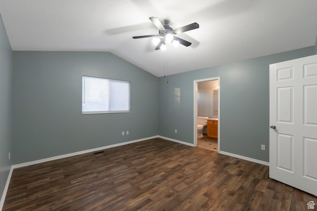 3388 W Briar Dr S, West Jordan, UT 84084 - unfurnished bedroom featuring dark wood-style floors, vaulted ceiling, baseboards, ensuite bathroom, and ceiling fan