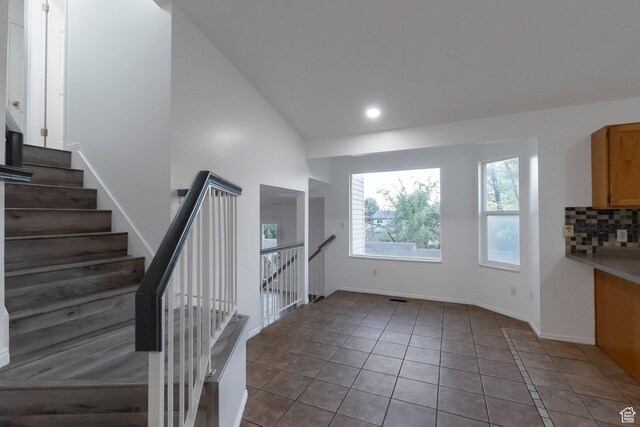 3388 W Briar Dr S, West Jordan, UT 84084 - stairs with tile patterned floors, recessed lighting, and baseboards