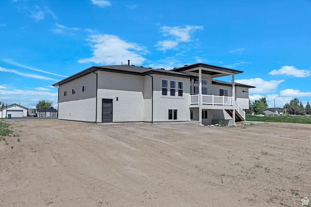 4594 S 6300 W, Hooper, UT 84315 - rear view of property with stucco siding