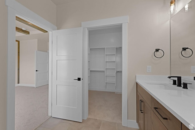 4594 S 6300 W, Hooper, UT 84315 - bathroom with vanity, a spacious closet, and baseboards