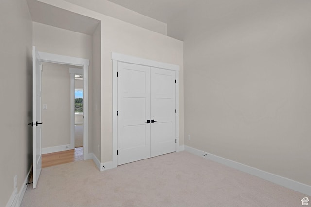 4594 S 6300 W, Hooper, UT 84315 - unfurnished bedroom featuring carpet floors, a closet, and baseboards