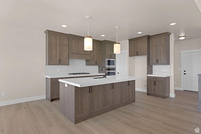 4594 S 6300 W, Hooper, UT 84315 - kitchen with a sink, stainless steel appliances, baseboards, light wood-type flooring, and recessed lighting