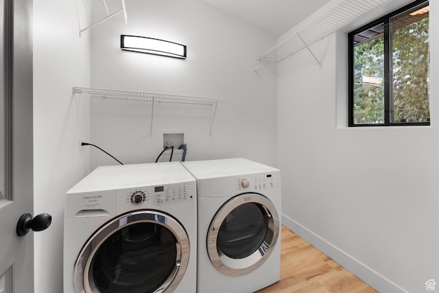 4077 N Devonshire Cir, Provo, UT 84604 - laundry room with independent washer and dryer, wood finished floors, and baseboards