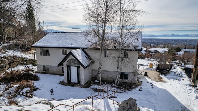 4077 N Devonshire Cir, Provo, UT 84604 - view of front facade featuring stone siding and roof with shingles