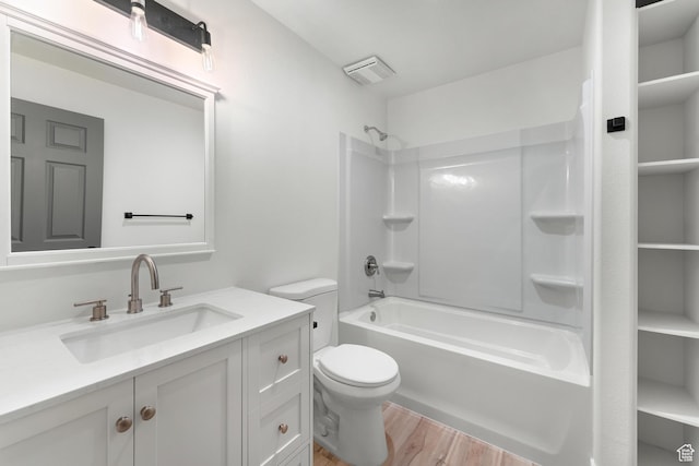 4077 N Devonshire Cir, Provo, UT 84604 - full bathroom featuring vanity, shower / bath combination, toilet, and wood finished floors