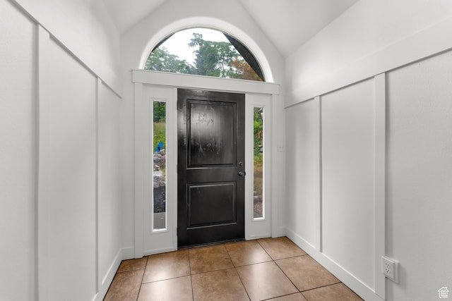 4077 N Devonshire Cir, Provo, UT 84604 - foyer entrance featuring lofted ceiling, tile patterned flooring, and baseboards