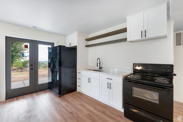 4077 N Devonshire Cir, Provo, UT 84604 - kitchen with black appliances, a sink, open shelves, french doors, and white cabinets