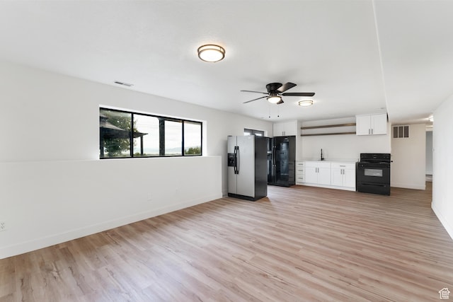4077 N Devonshire Cir, Provo, UT 84604 - unfurnished living room with light wood-style floors, ceiling fan, baseboards, and a sink