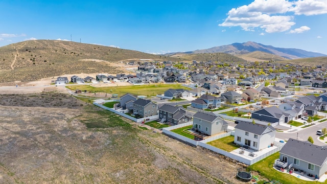 1815 E Thunder Gulch Rd, Eagle Mountain, UT 84005 - aerial view of residential area with mountains