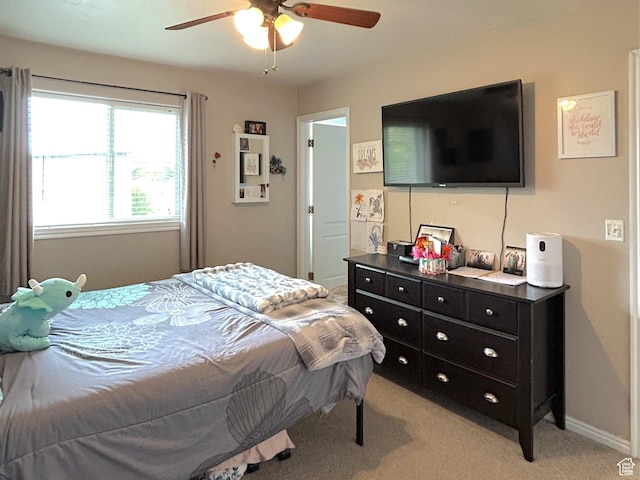 434 S 2nd E, Soda Springs, ID 83276 - bedroom with light carpet, ceiling fan, and baseboards