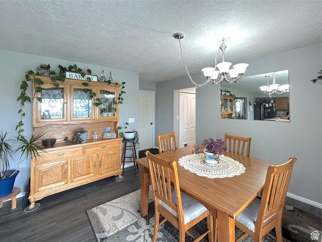434 S 2nd E, Soda Springs, ID 83276 - dining area with a chandelier, dark wood-style flooring, a textured ceiling, and baseboards