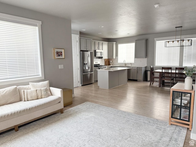 934 W 2740 N, Lehi, UT 84043 - living area with light wood-style flooring and recessed lighting