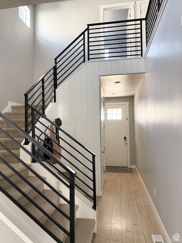 934 W 2740 N, Lehi, UT 84043 - foyer entrance featuring light wood finished floors, stairs, and baseboards