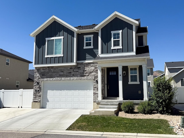 934 W 2740 N, Lehi, UT 84043 - view of front of property with board and batten siding, stone siding, a garage, and a porch