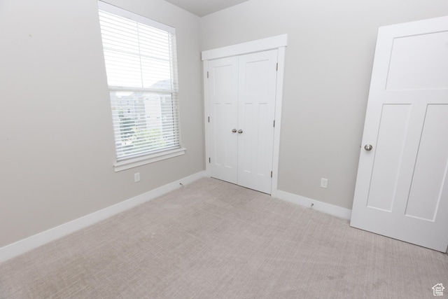 66 W Silver Springs Dr, Vineyard, UT 84059 - unfurnished bedroom featuring carpet floors, baseboards, and a closet