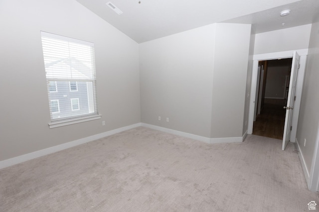 66 W Silver Springs Dr, Vineyard, UT 84059 - unfurnished room with lofted ceiling, healthy amount of natural light, light colored carpet, and baseboards