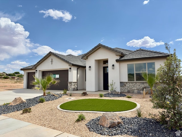 525 N 3380 W Unit 16, Hurricane, UT 84737 - ranch-style home with stone siding, a garage, stucco siding, concrete driveway, and a tile roof
